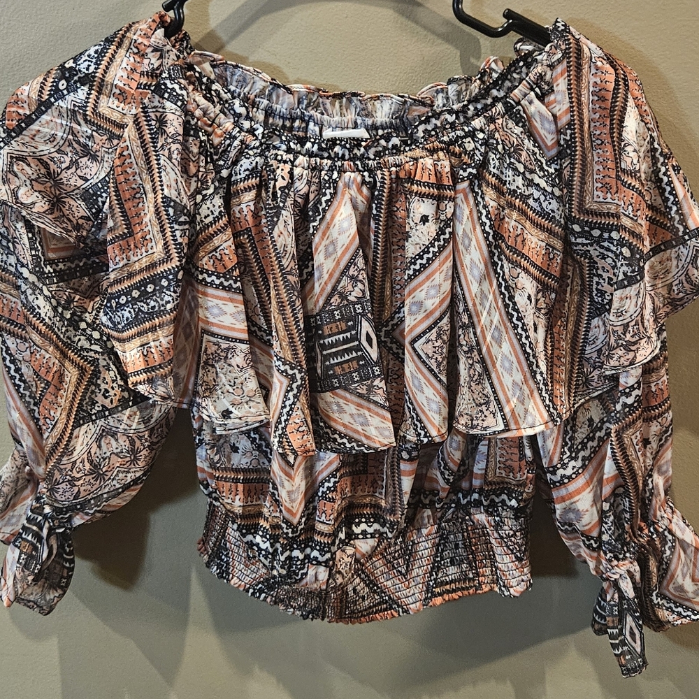 Worn once multi colored blouse